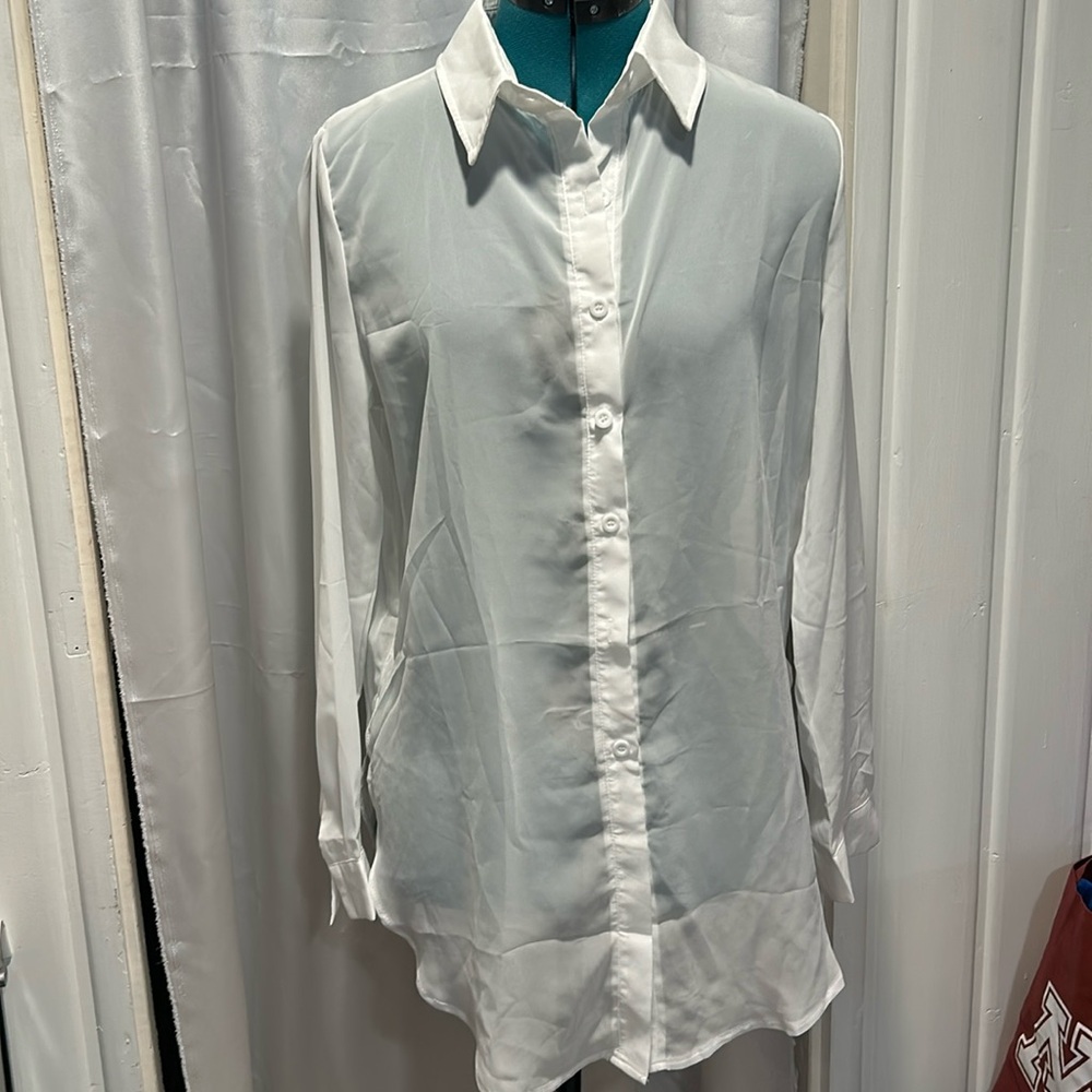 Off white Sheer top. New in bag. Never worn.